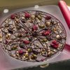 Dark chocolate fruit and nut pizza