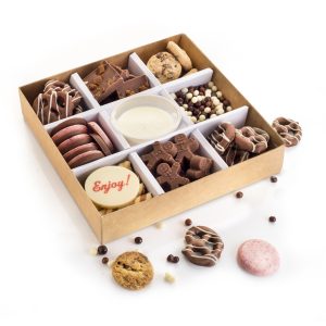 Chocolate grazing box with dipping pieces sprinkled round.